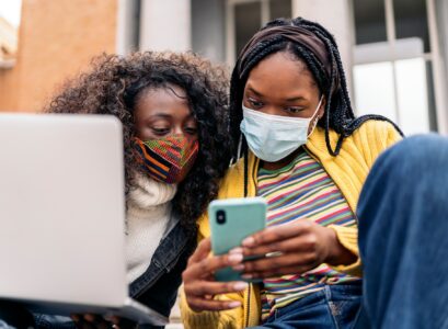 Cool Afro Girls Using Phone