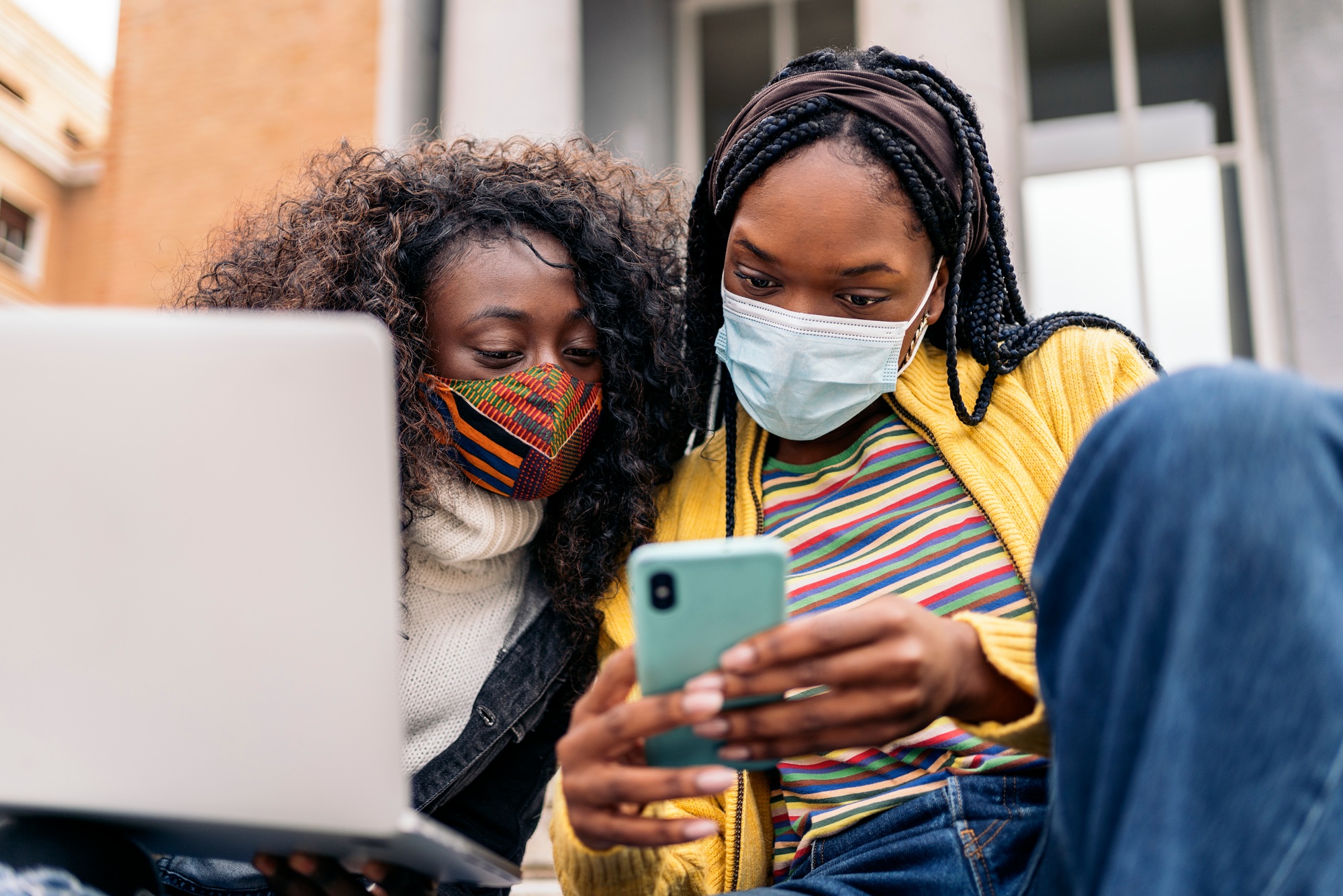 Cool Afro Girls Using Phone