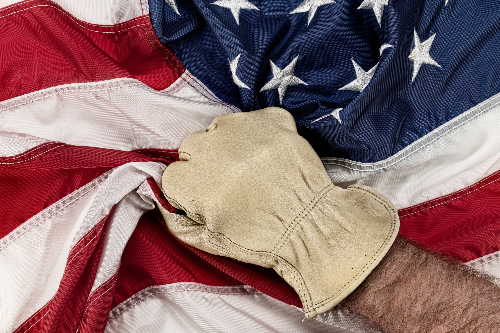 Man grasping American Flag